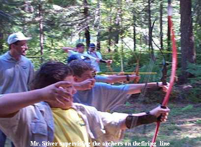 Mr. Stiver supervising the archers on thefiring  line