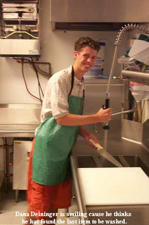 Dana Deininger is smiling cause he thinks 
he has found the last item to be washed.