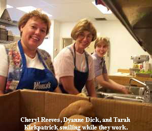 Cheryl Reeves, Dyanne Dick, and Tarah 
Kirkpatrick smiling while they work.